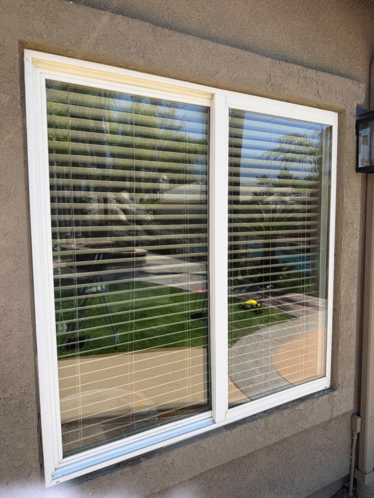 Crystal clear sliding windows after professional cleaning